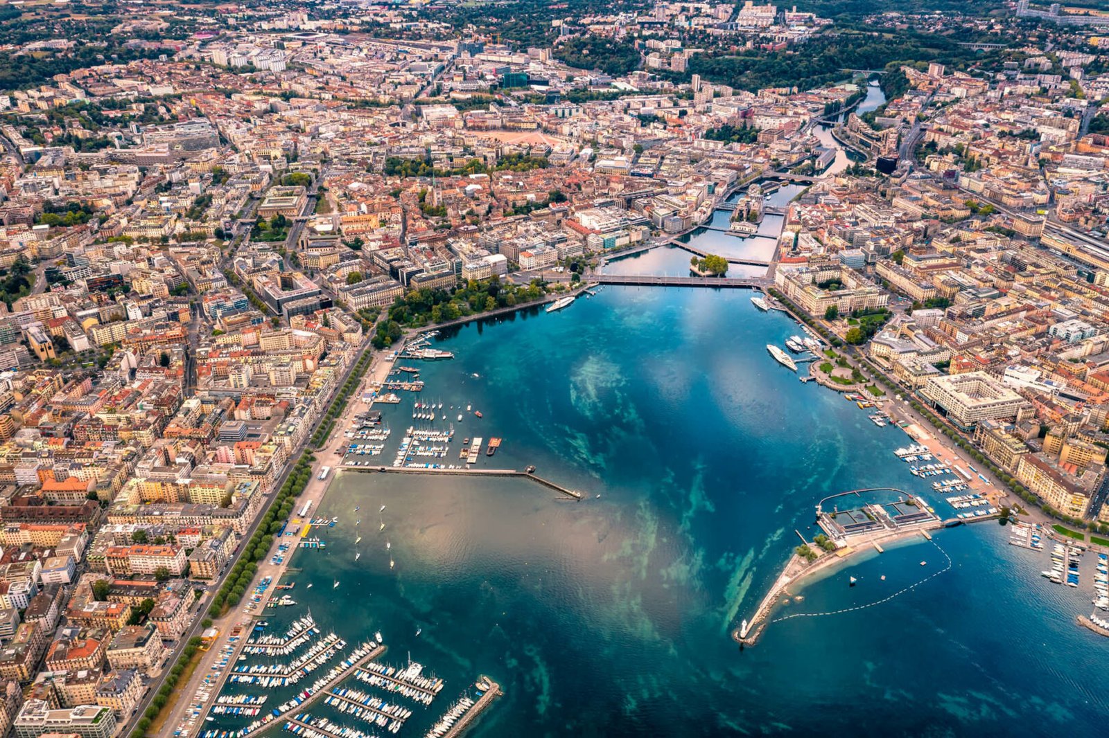 Aerial view of Geneva city(GettyImages-1056772492)-1621x1080